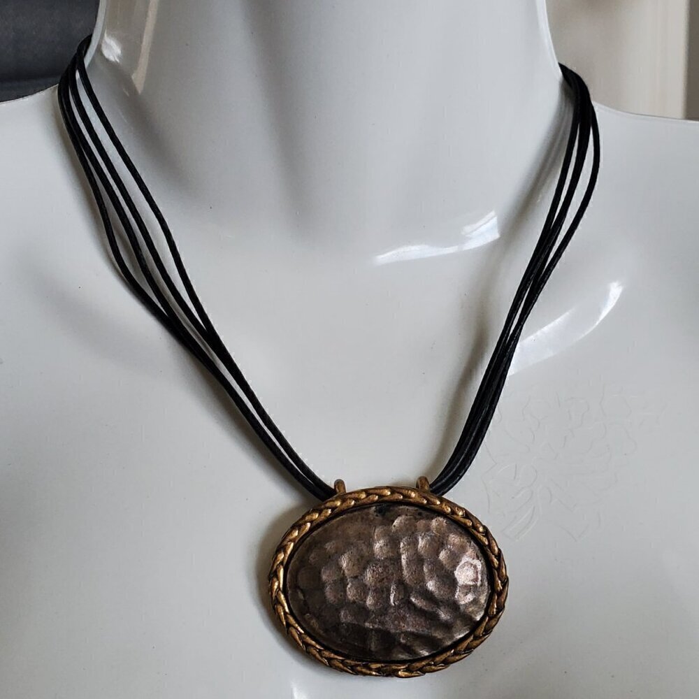 Four-strand cord necklace with hammered pendant